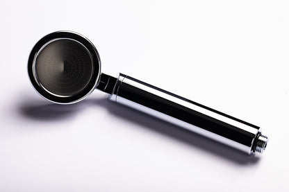 Black Luscentra handheld shower filter on a white background.