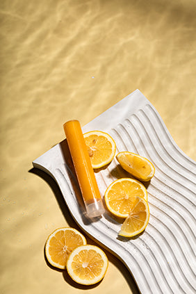 Luscentra citrus vitamin C shower capsule on a white background.