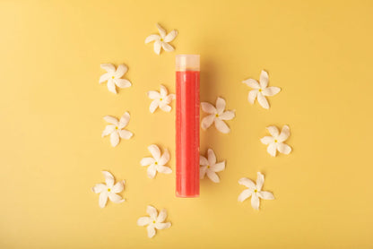Luscentra jasmine vitamin C capsule with jasmine flowers on yellow.