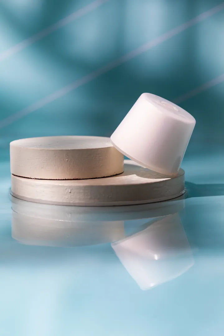 Luscentra wall-mount vitamin C shower capsule on a white background.