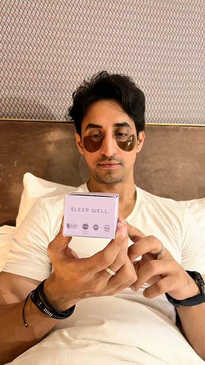 Person holding a Luscentra vitamin C shower-capsule package.